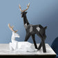 Reindeer Figurines Sculpture – Capture the Spirit of the Season (Set of Two)